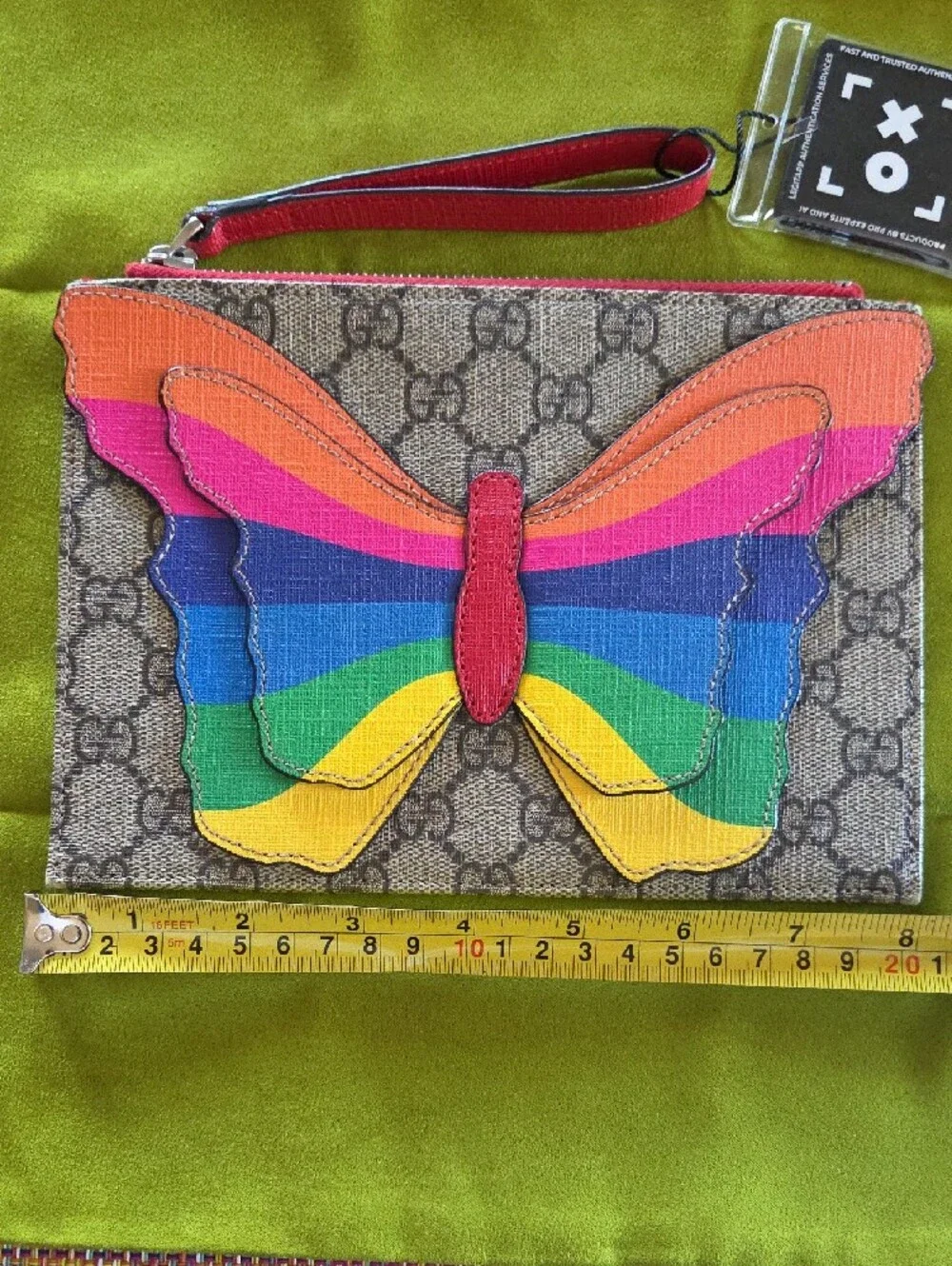 Gucci GG Supreme Butterfly Clutch